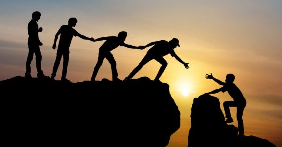 group-of-people-on-peak-mountain-climbing-helping-team-work-travel-picture-id927720230 group-of-people-on-peak-mountain-climbing-helping-team-work-travel-picture-id927720230